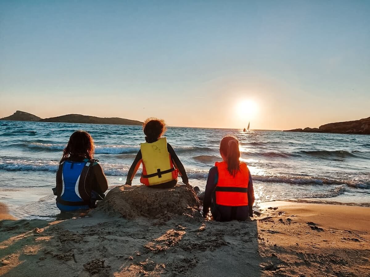 A small group of children from Boundless Life admire the sunrise.