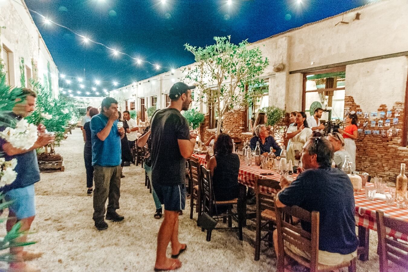 Boundless Life families and community gather in the evening while traveling in Syros Greece.