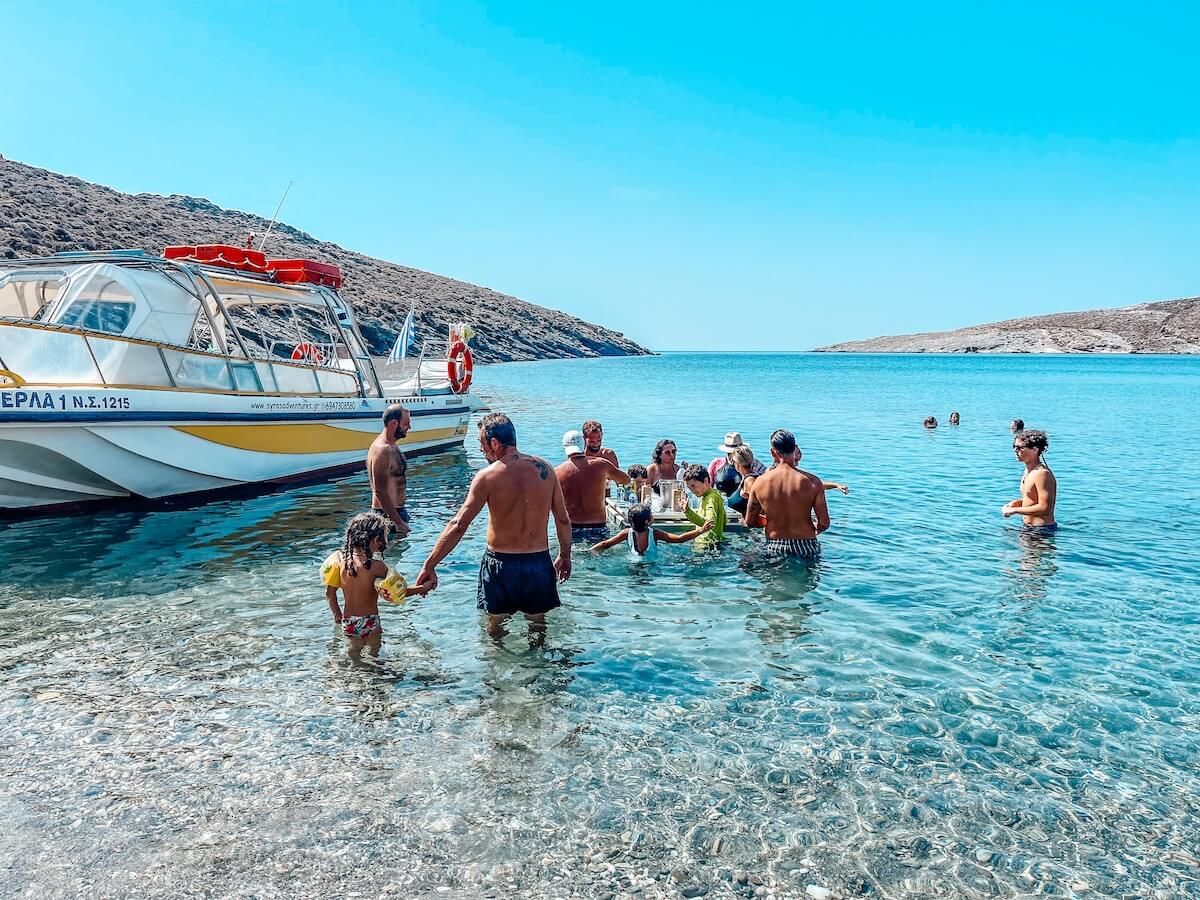 Boundless Life families and their kids gather in the water enjoying a summer day in Syros