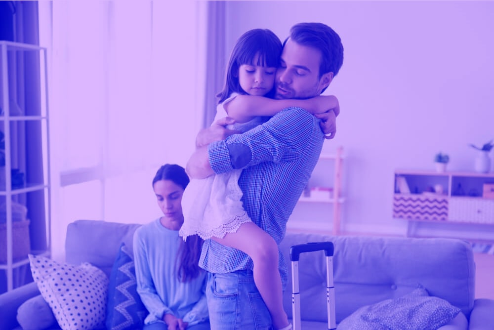 a man holding a child