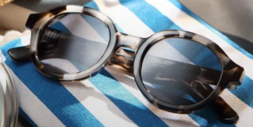 Sunglasses on a towel