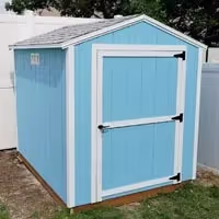 A 6 foot by 8 foot value apex shed in blue and white