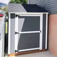 an 8 foot by 6 foot value apex shed with a door on the side wall