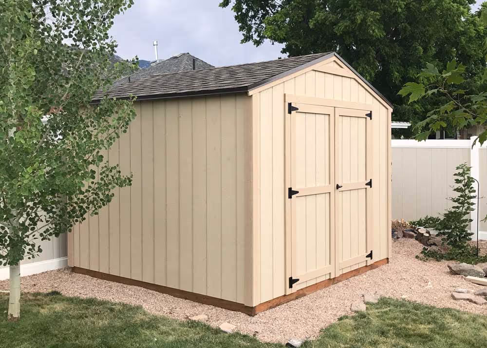 An unpainted 10 foot by 12 foot standard apex shed with a 6 foot double door