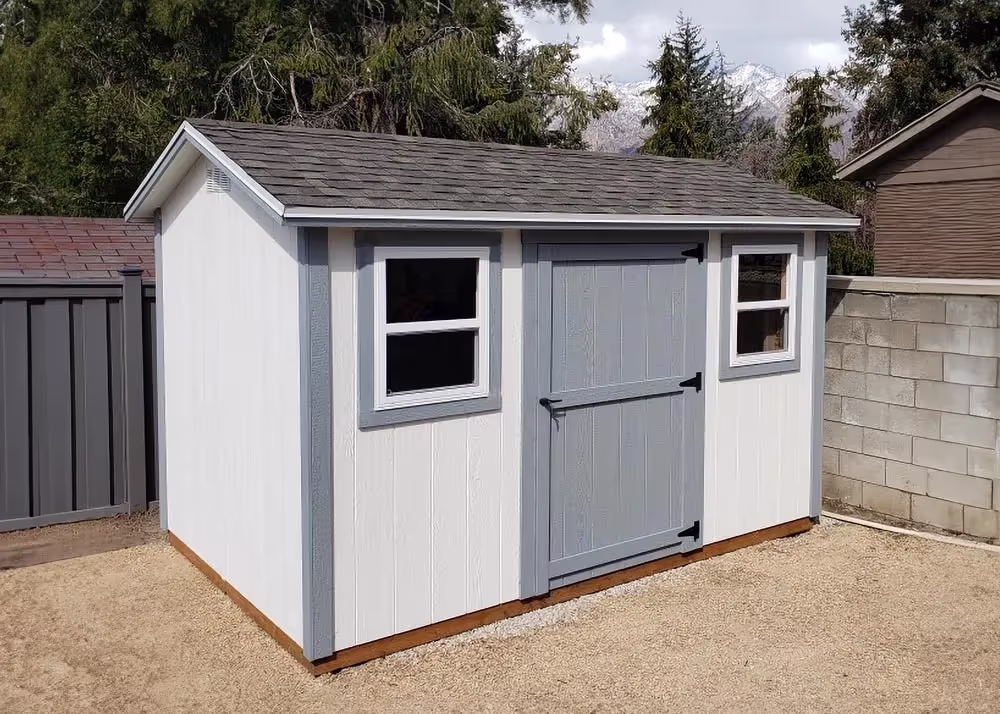 A 10 foot by 12 foot standard apex shed with a single door and two windows on the sidewall