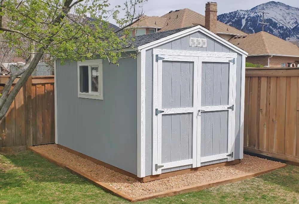 An 8 foot by 12 foot standard apex shed with a 6 foot double door and a window
