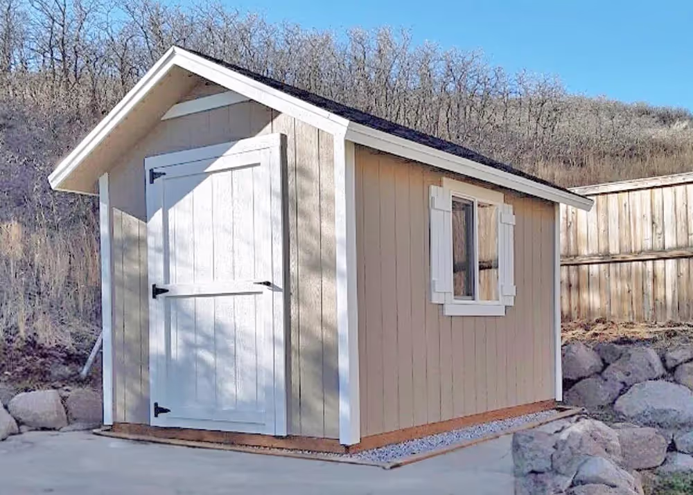 An 8 foot by 12 foot standard apex with a custom 6-12 roof pitch and 12 inch roof overhang