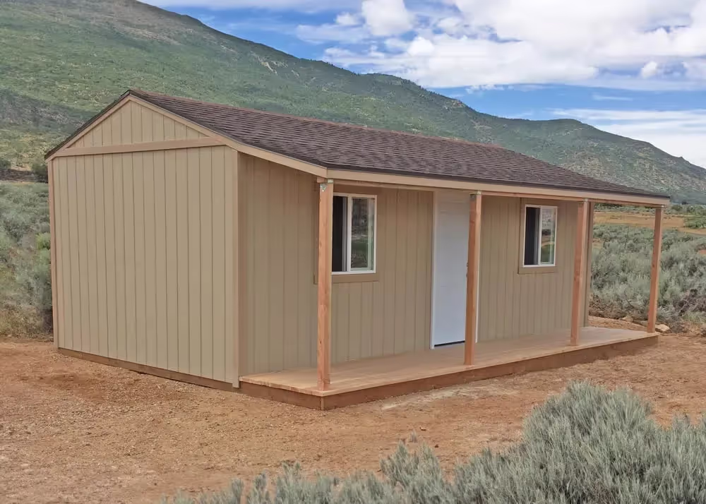 A 10' x 20' Tall Apex Shed cabin with a 4' deep porch