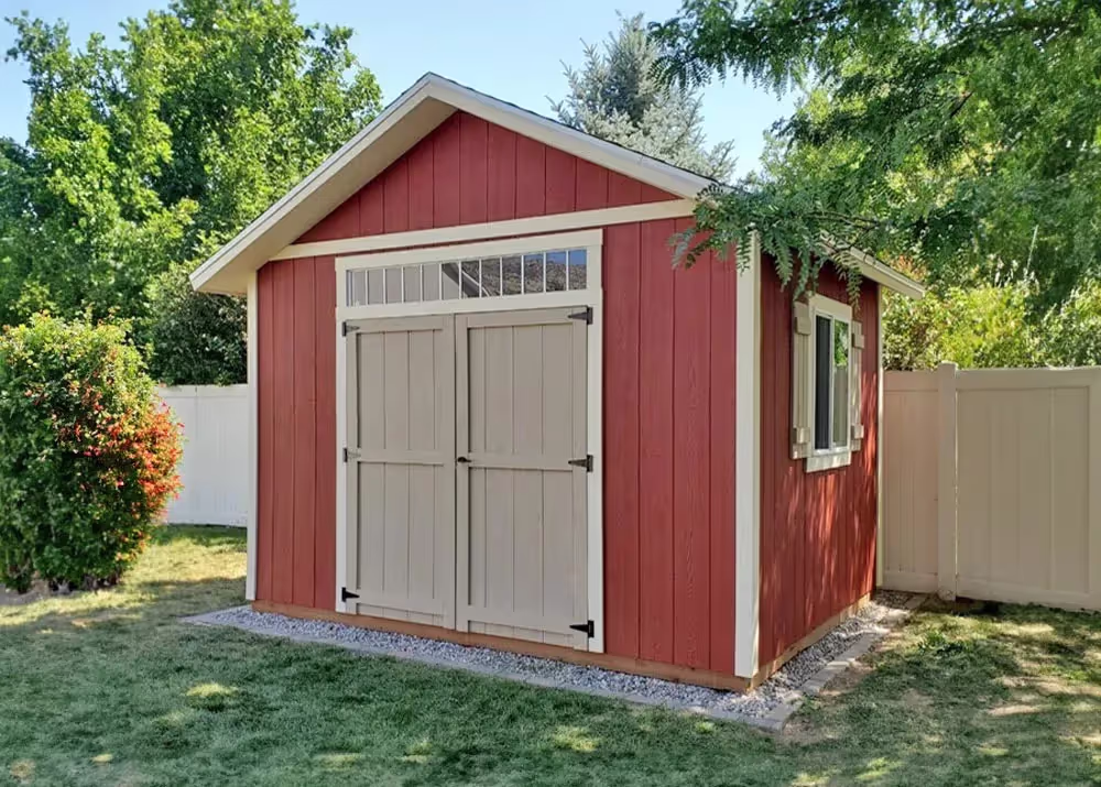 A 12' x 12' Tall Apex Shed with 6/12 Roof Pitch, 12" overhang and a transom window over the double doors