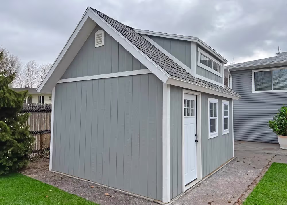 A custom 12' x 16' Tall Apex Shed with a custom roof pitch and a dormer