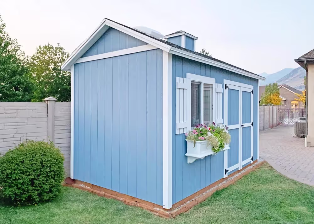 An 8' x 16' Tall Apex with Custom roof pitch, 6" roof overhang and a cupola