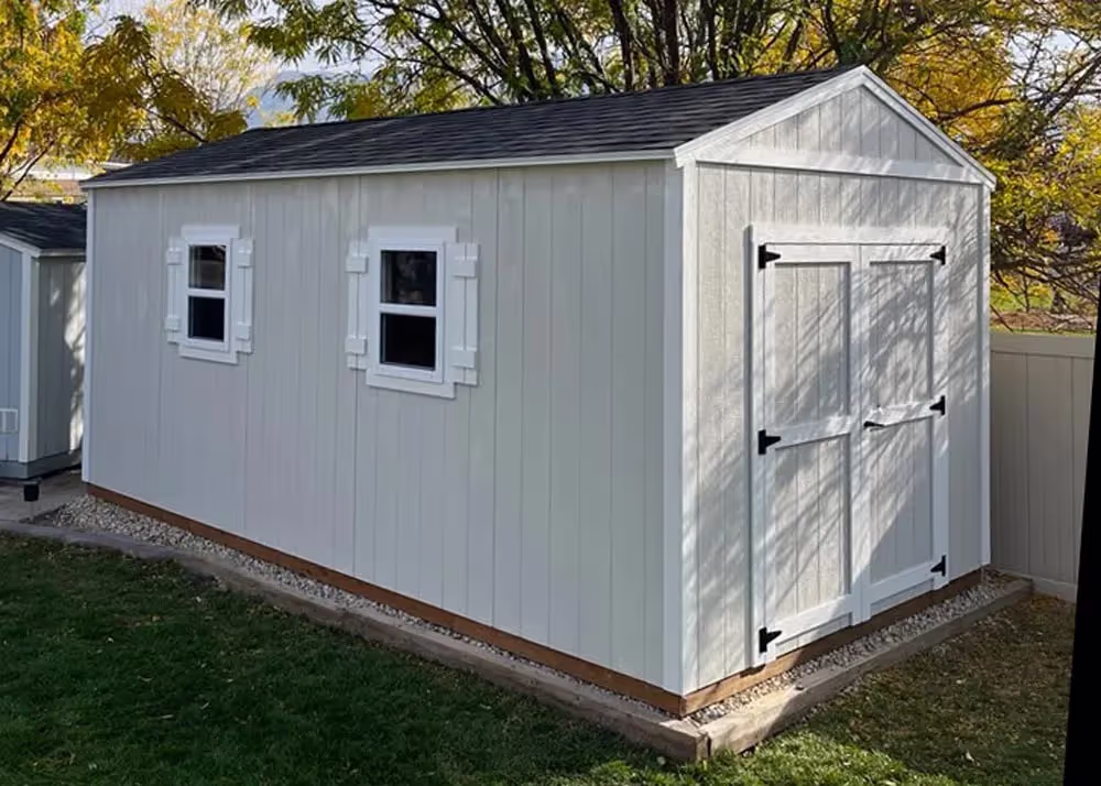 A basic 10' x 20' Tall Apex with a couple of windows and a 6' double door