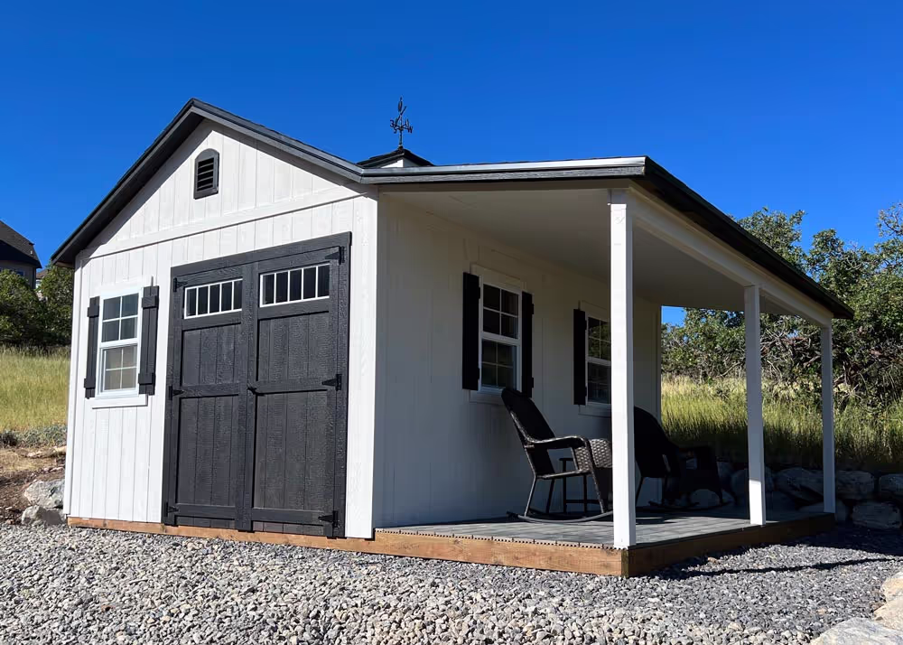 A 12 foot by 16 foot tall apex shed with a porch overhang, deck and more