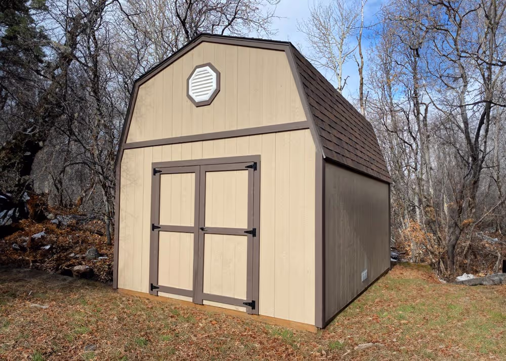 A 12 foot by 16 foot standard barn with a double door and an octagonal vent