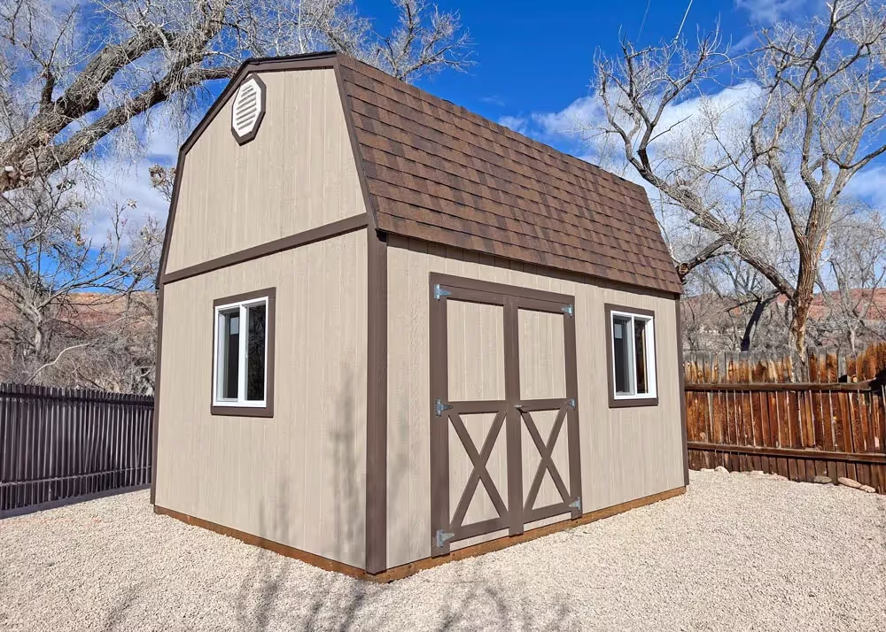 A 12 foot by 14 foot tall barn storage shed with custom door trim
