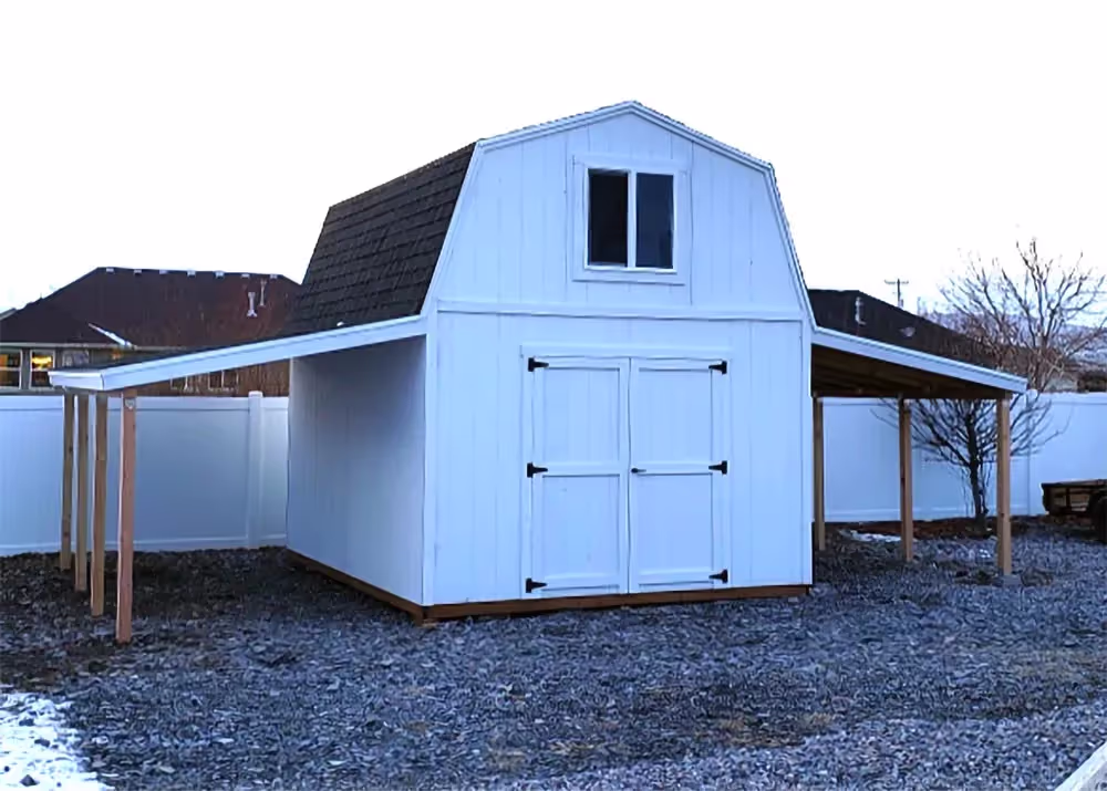 A 12 foot by 16 foot tall barn shed with double porch overhangs