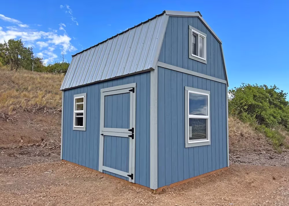 A 10 foot by 14 foot tall barn shed with a gray metal roof