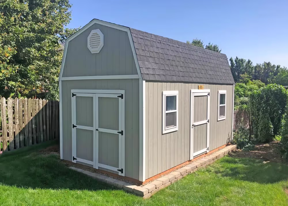 An awesome 10 foot by 20 foot tall barn shed with an extra door and windows on the side wall