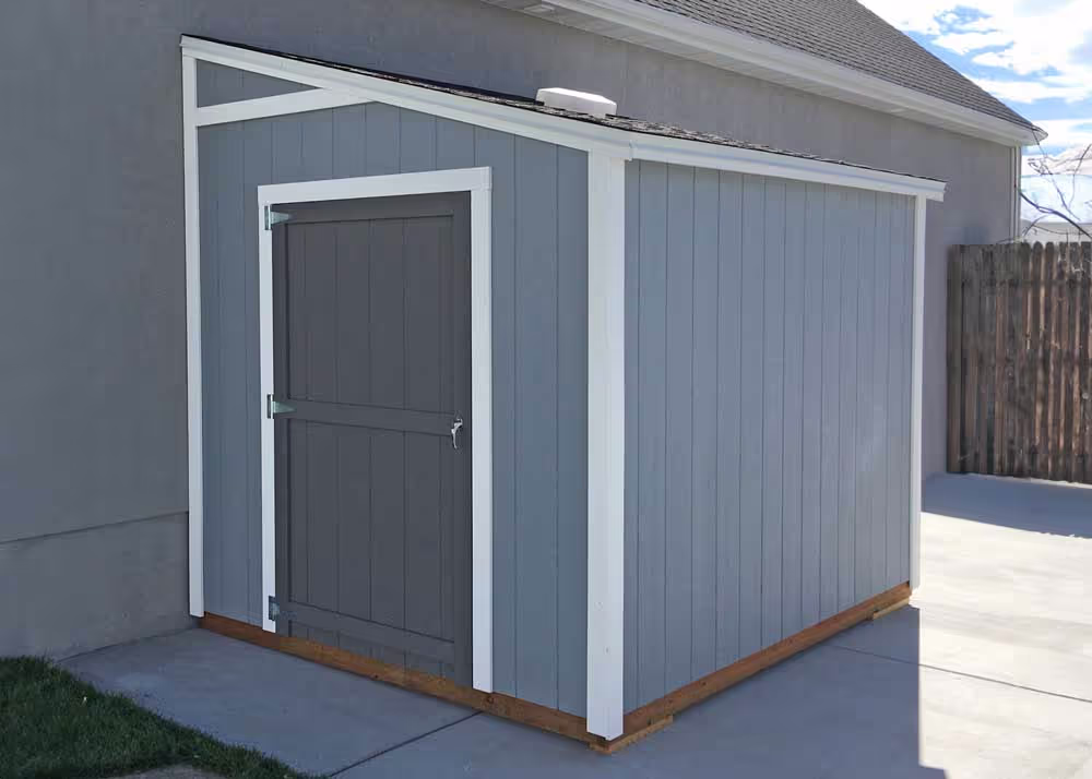 An 8 foot by 10 foot Lean-To shed with a shed light translucent roof vent