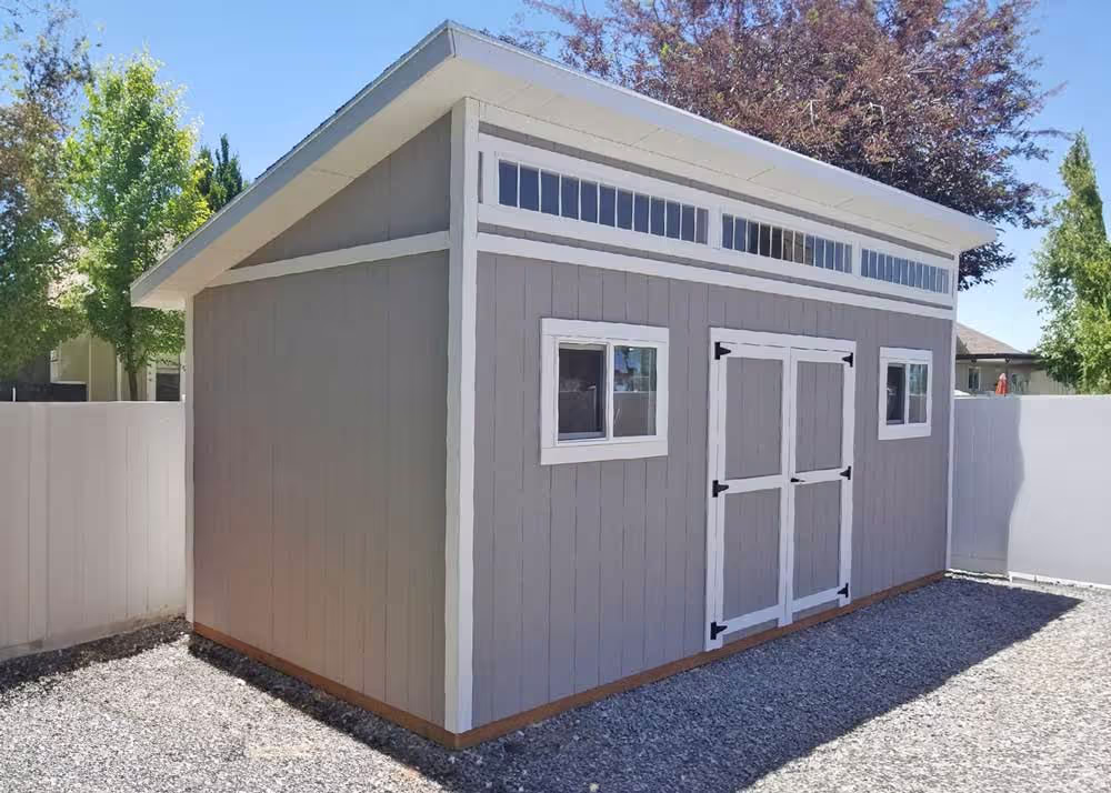 A 10 foot by 20 foot Tall Lean-To shed with Transom windows, a 12" roof overhang and more