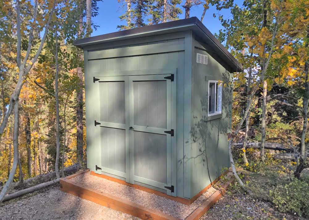 A 6 foot by 8 foot Lean-To storage shed at a mountain property