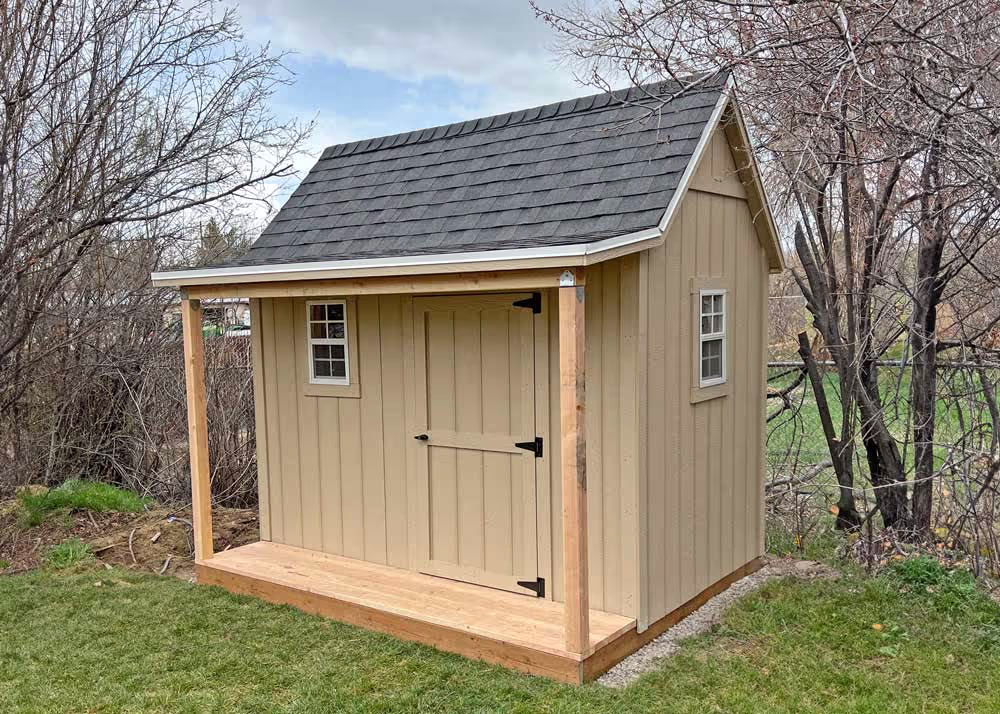 An 8 foot by 10 foot Standard Apex Shed Playhouse with a porch