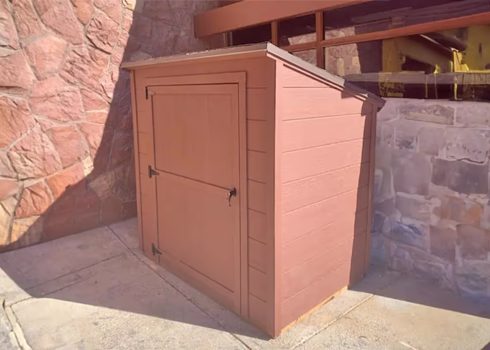 A 4 foot by 6 foot Yard Hutch shed with horizontal siding