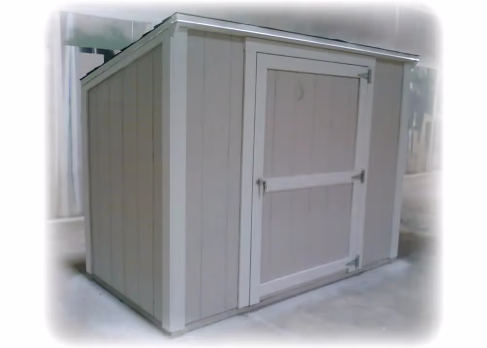 A 4 foot by 6 foot Yard Hutch mini lean-to storage shed