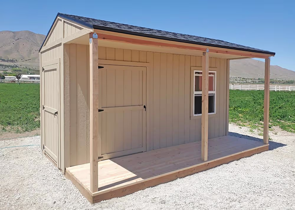 A 10 foot by 16 foot Tall Tack Shed that is unpainted