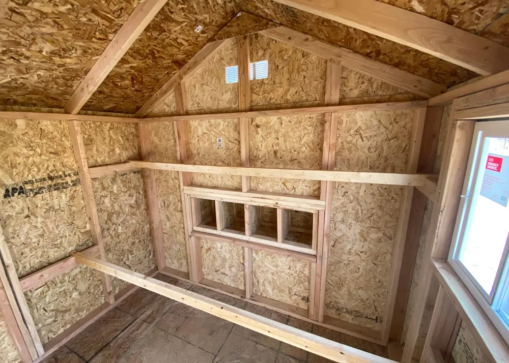 Interior of a Coop De'Ville chicken coop showing the nesting boxes