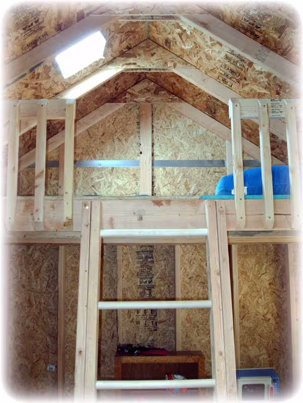 A loft inside of one of our clubhouse playhouses
