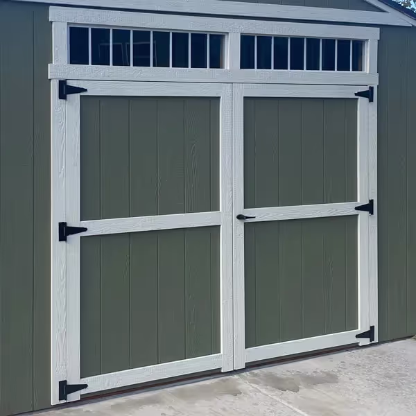 An 8' wide double shed door with 2 46" transom windows above it. 