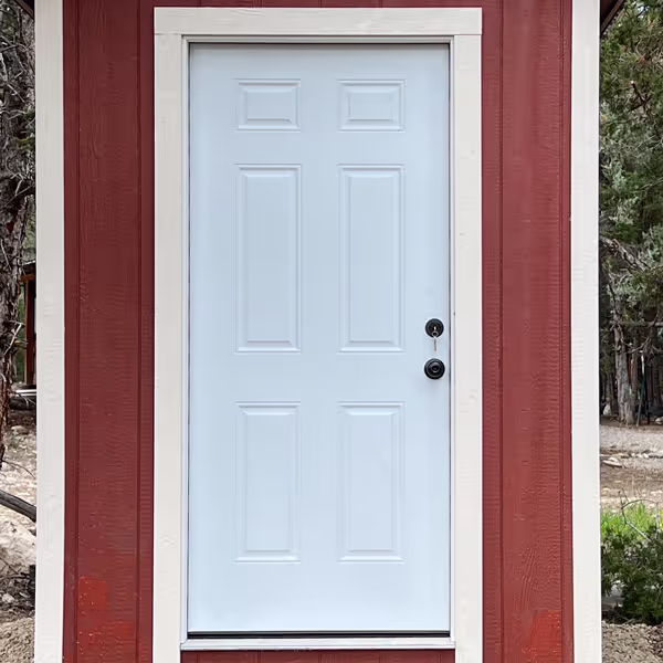 Our 36" Steel Entry door on small tall apex shed used for an outhouse.