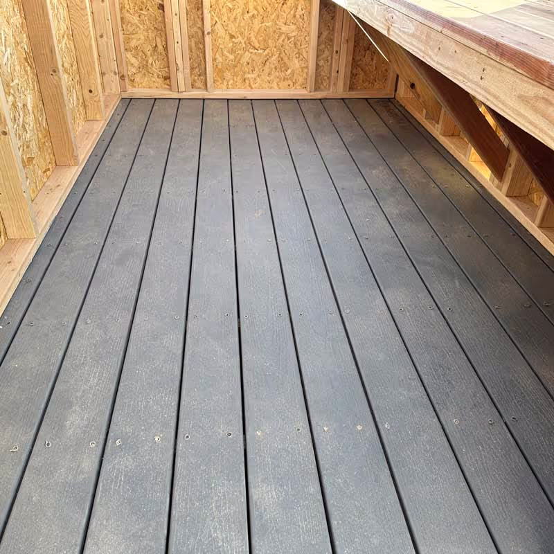 Our composite decking used as a floor in one of our greenhouse sheds