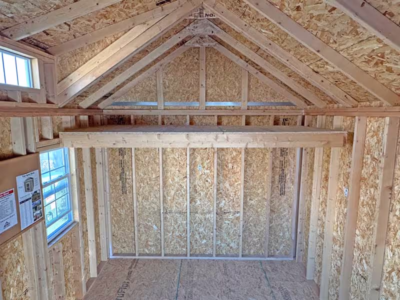 A Tall Apex shed with a loft below the top of the walls