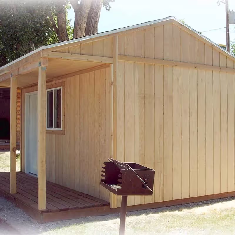 Tack Shed with T-111 natural wood siding for rustic durability and storage.