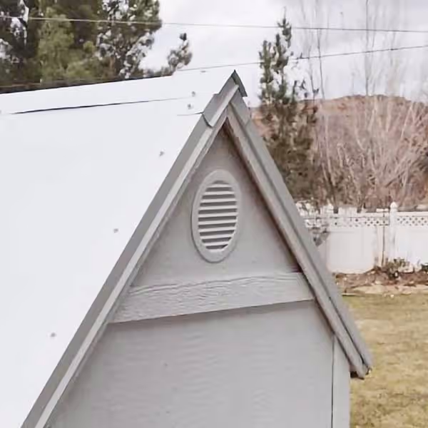 6-inch round vent installed on a chicken coop for optimal airflow and ventilation. Durable & weatherproof.