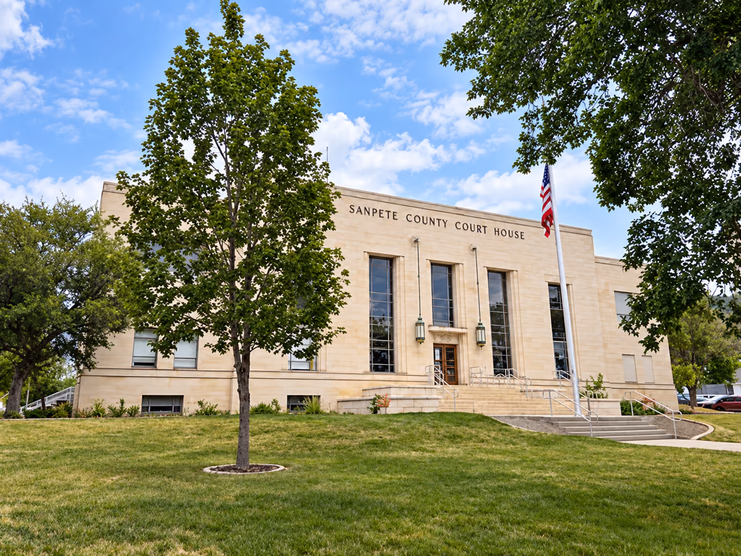 Sanpete County Courthouse surrounded by summer greenery