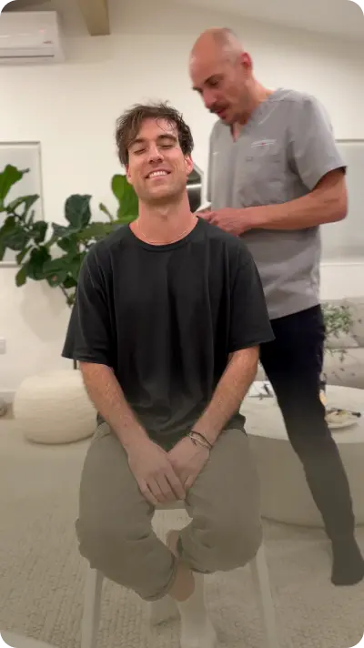 A person that just received the reset and floats, feels relief and rush of energy and oxygen in their brain, the person looks relaxed, pain free and free, a postresetglow