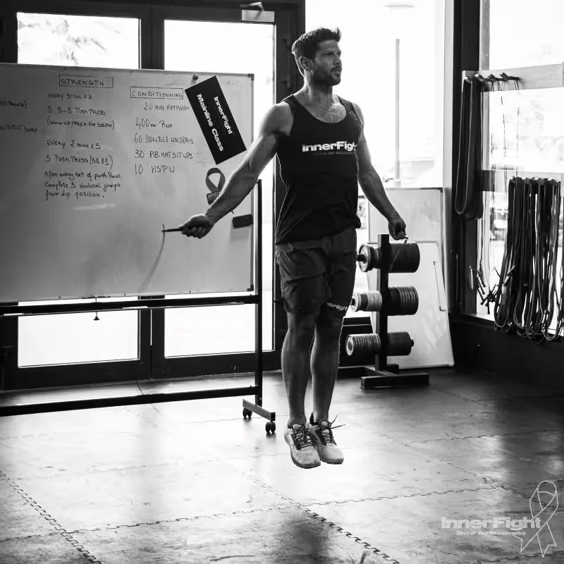 Male CrossFit athlete performing double-unders