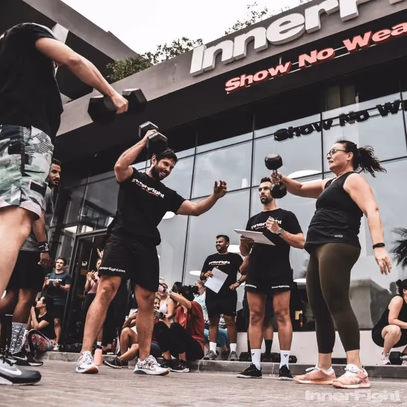 Group CrossFit Workout Class Men and Women Outdoors