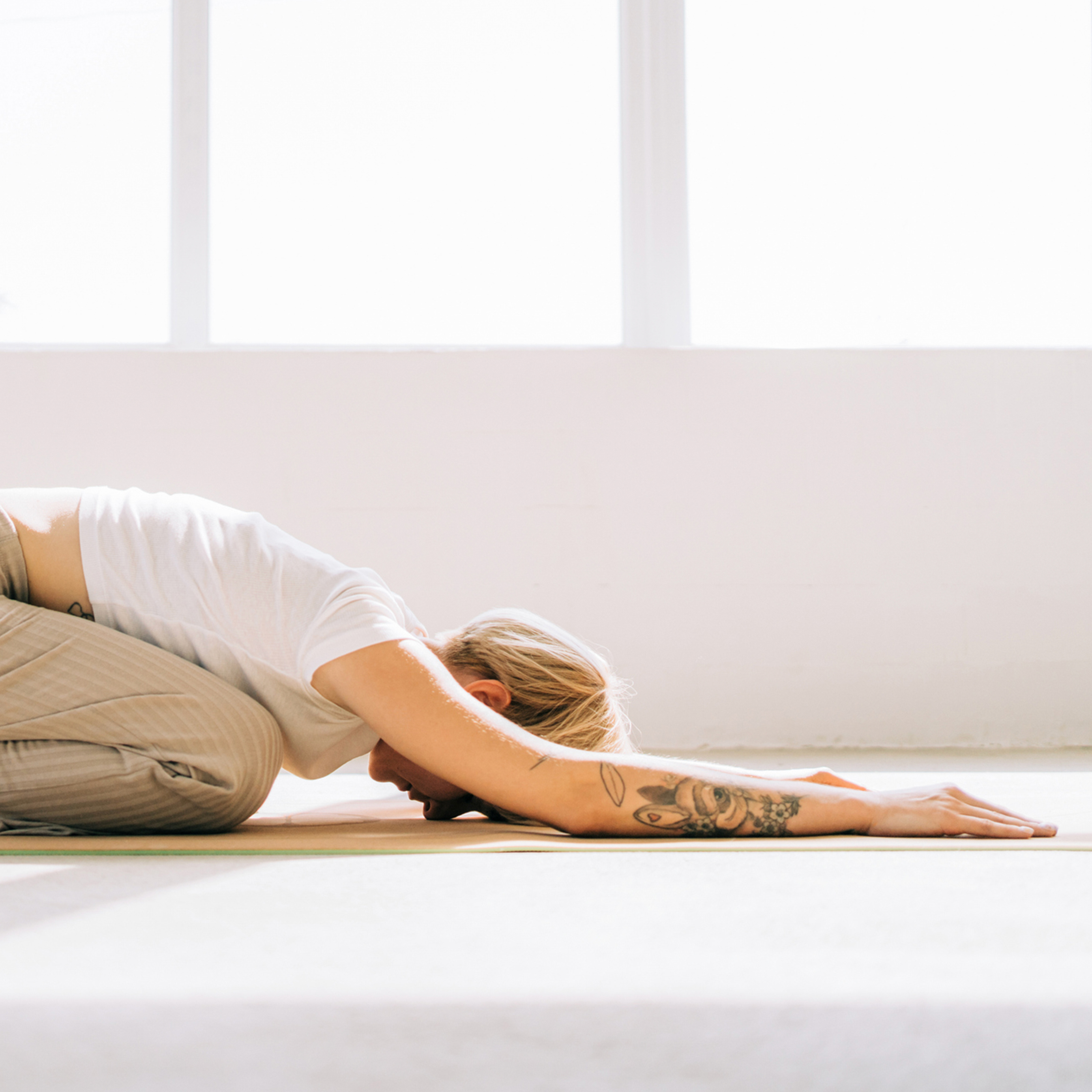 woman in child's pose