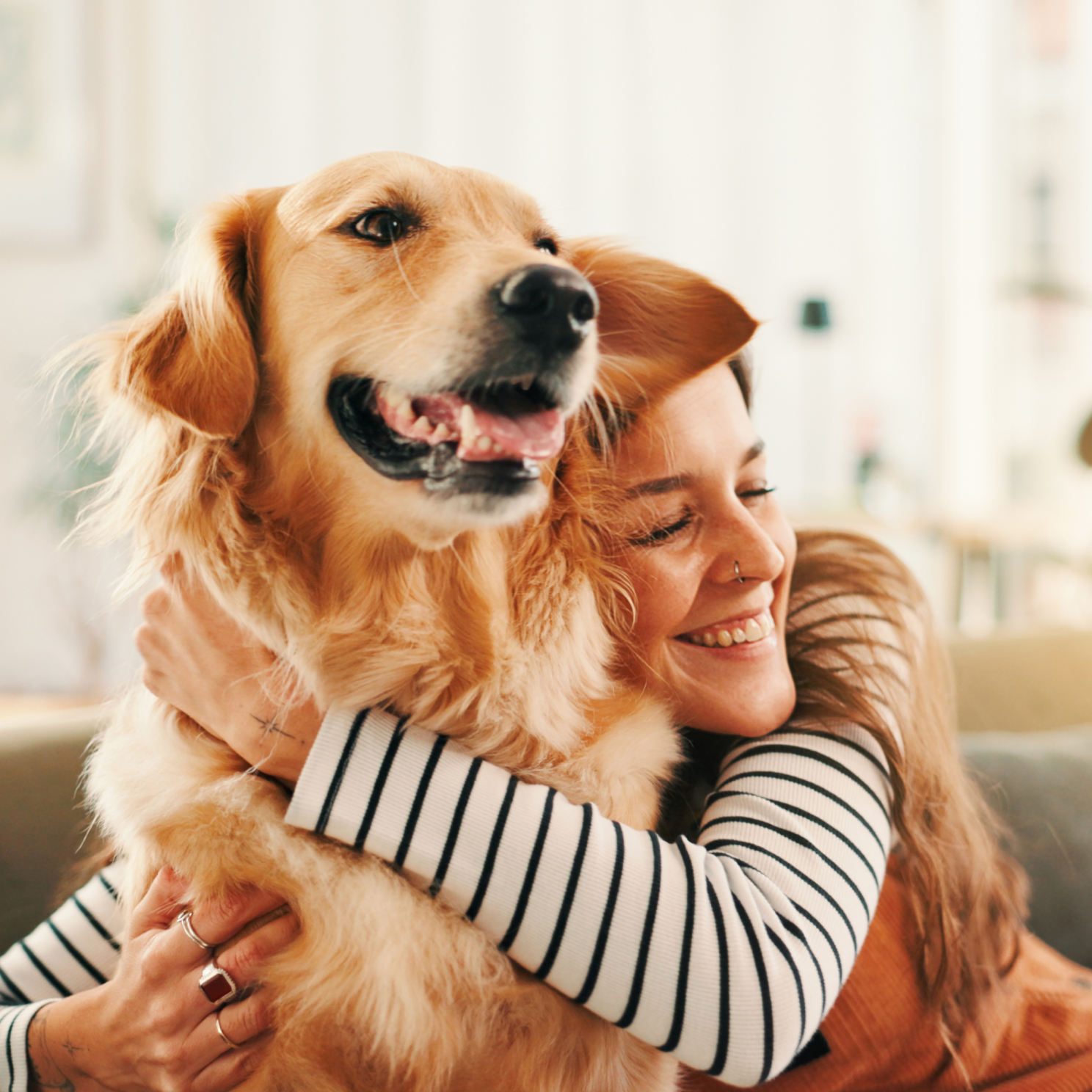 Woman smiling with her dog