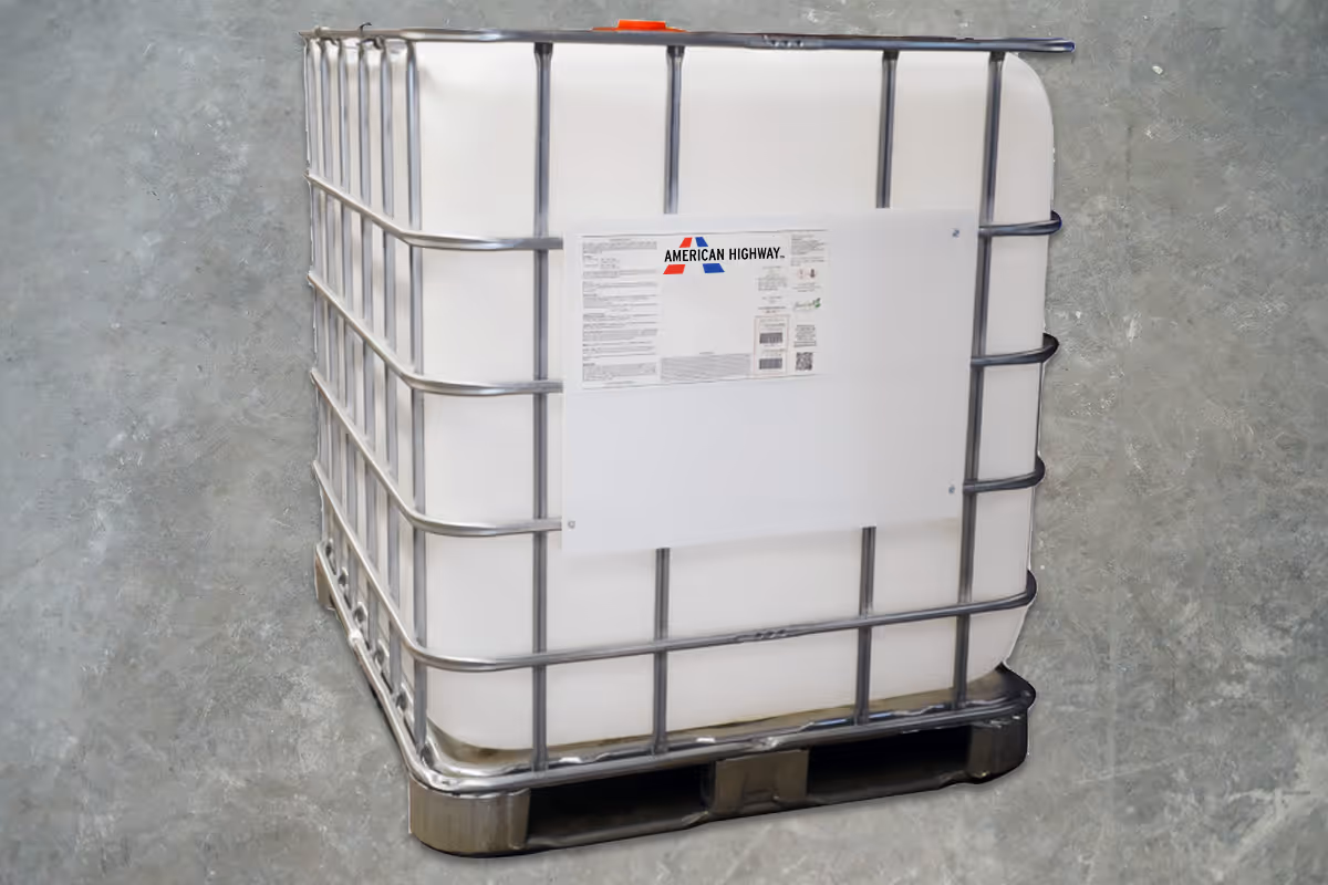 American Highway’s curing agents applied to warehouse concrete flatwork, enhancing strength and preventing cracking in high-traffic environments. Close-up of American Highway’s curing compound on industrial flatwork, ensuring moisture retention for durable concrete surfaces.