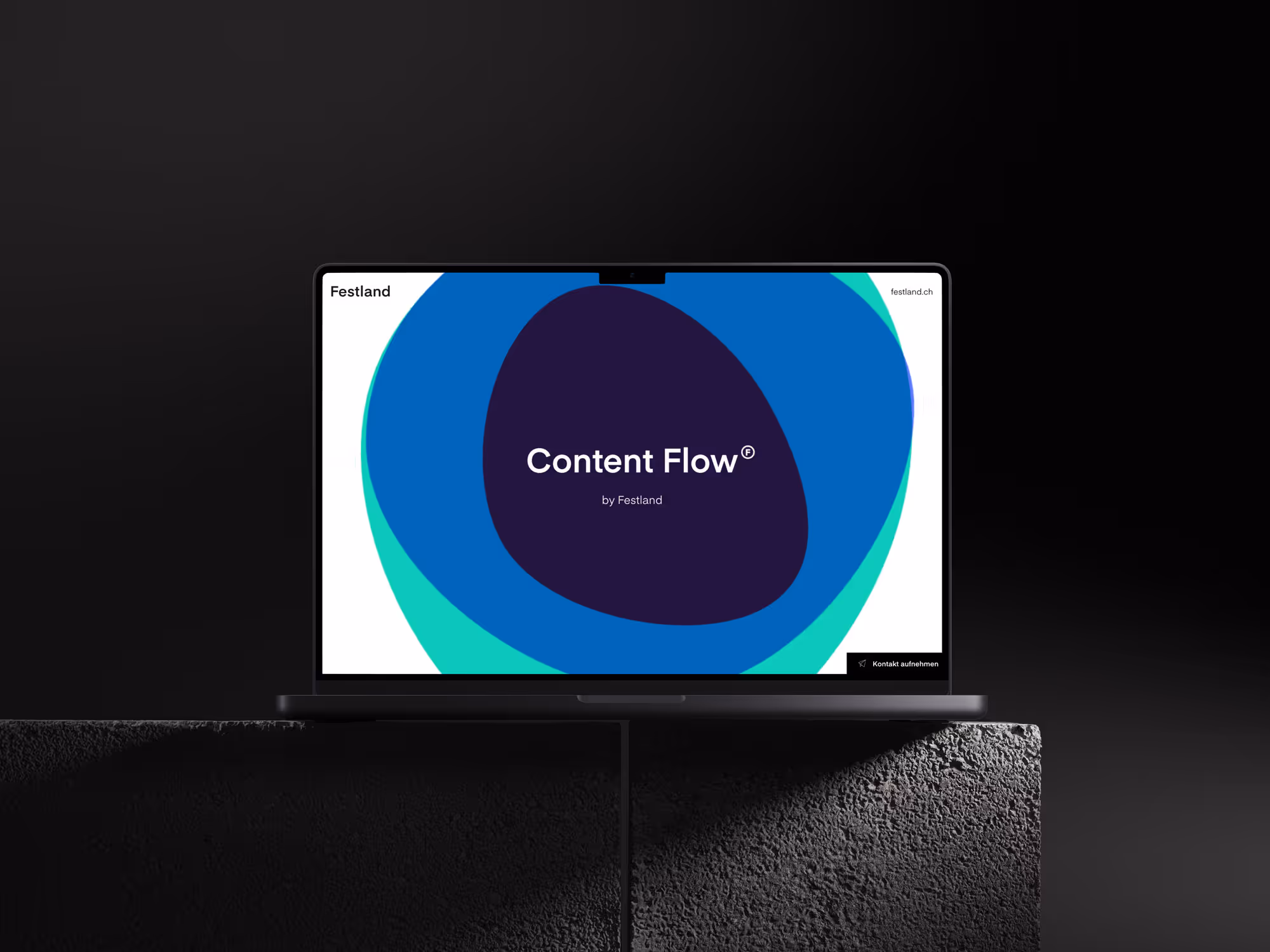 Laptop displaying Content Flow logo with blue and green circular design