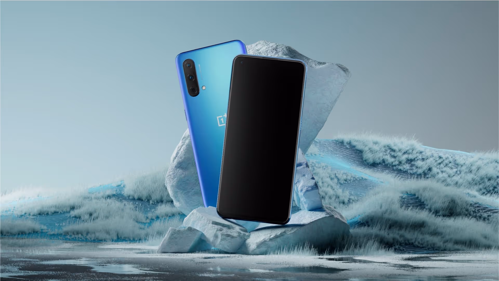 Two OnePlus devices stand on an icy landscape and background.