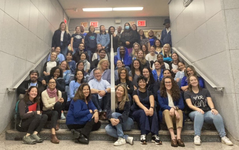 PS9 Staff sits in a stairwell