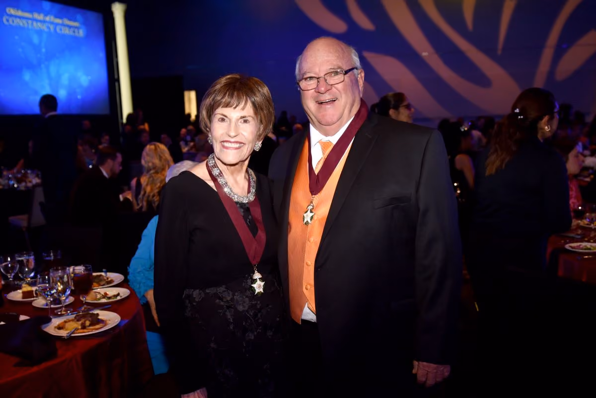 Oklahoma Hall of Fame Members, Mo Anderson & Dr. Barry Pollard, pose together at the 2024 Induction Ceremony.