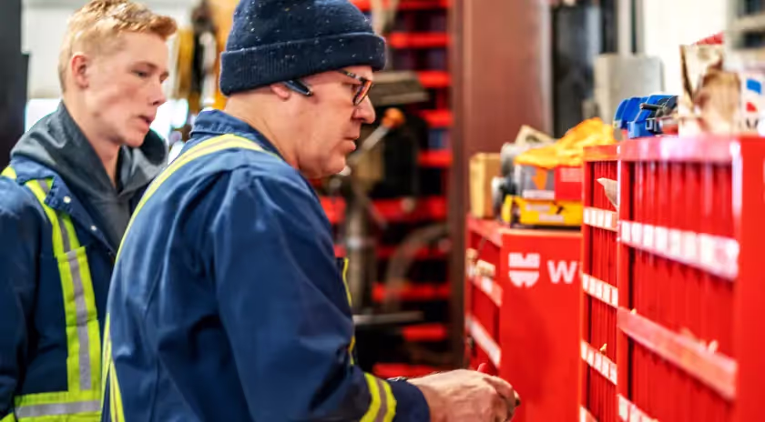 Diesel mechanic performing bus repair services in Edmonton, Alberta