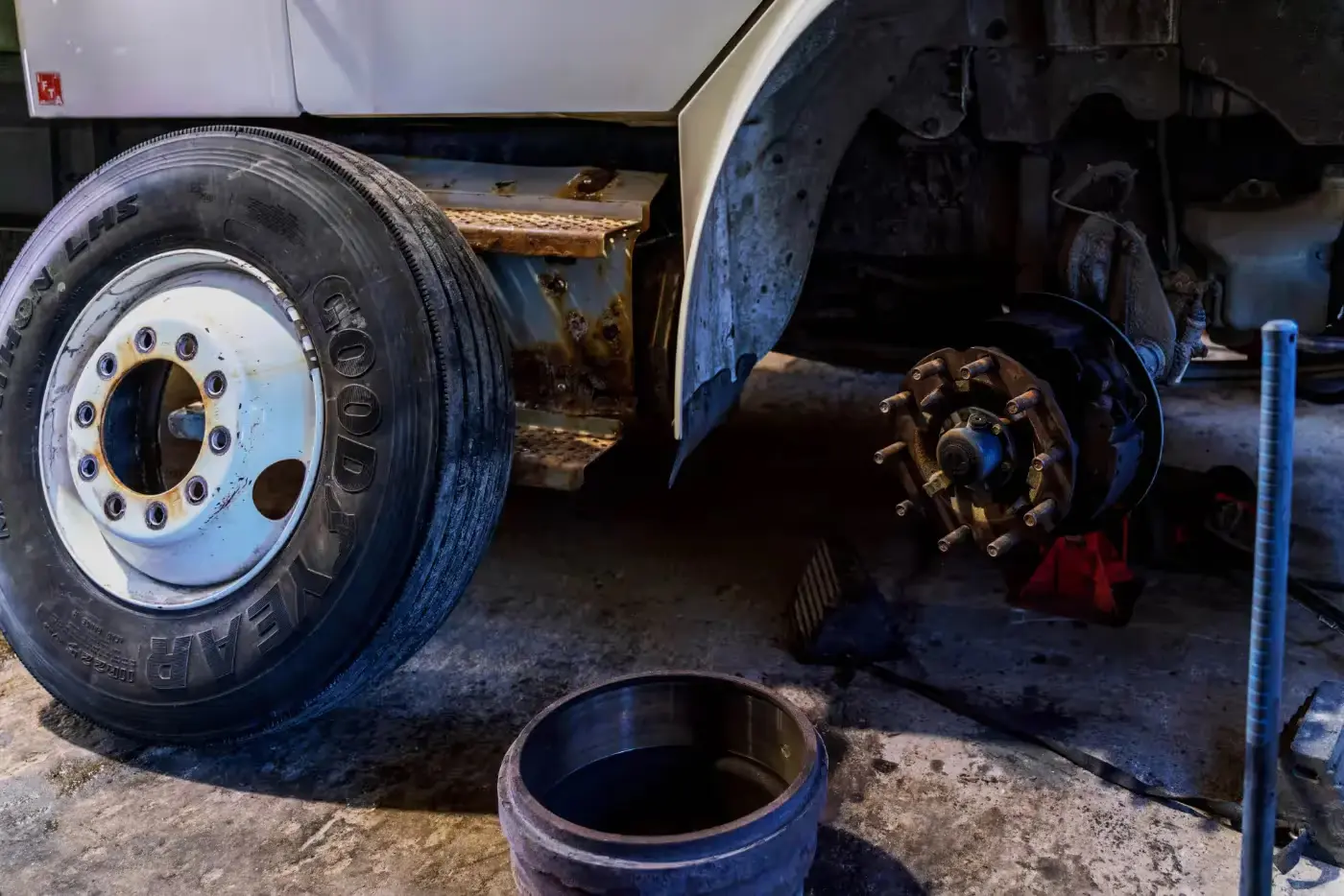 Diesel mechanic performing brake repair on semi truck in Edmonton, Alberta